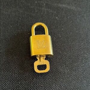 Louis Vuitton Gold Padlock with Key